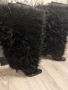 Woods by Jordyn “Rev Boot Black Feather”